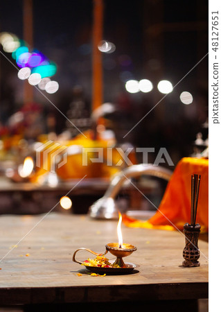 A Hindu priest performs the Ganga Aarti ritual A Hindu priest performs the Ganga Aarti ritual 48127651