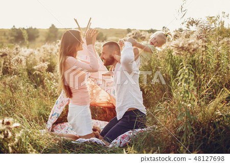 Family have fun in a park 48127698