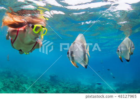 Young woman in snorkeling mask dive underwater 48127965