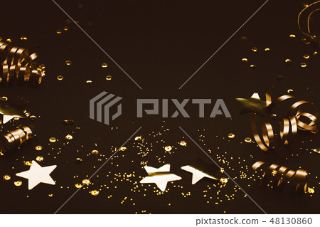 Golden decoration on black background. Place for text. Golden decoration on black background. Place for text. 48130860