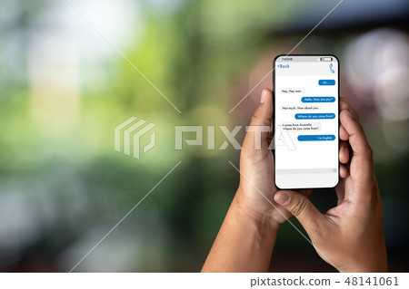 Man hand holding chatting with friends the  48141061