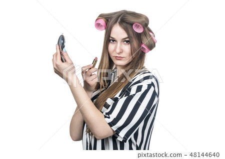 woman in curlers with lipstick 48144640