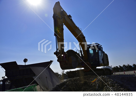 Diamond excavator: silhouette of hydraulic excavator lifted earth and sand all bucket Diamond excavator: silhouette of hydraulic excavator lifted earth and sand all bucket 48144935
