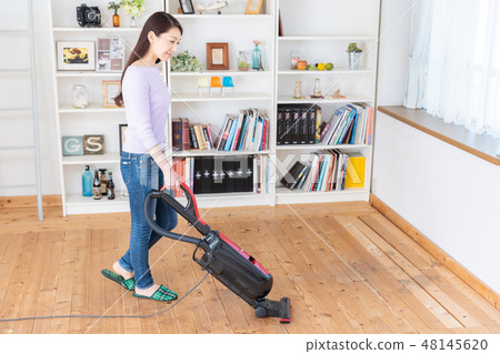 Woman cleaning Woman cleaning 48145620