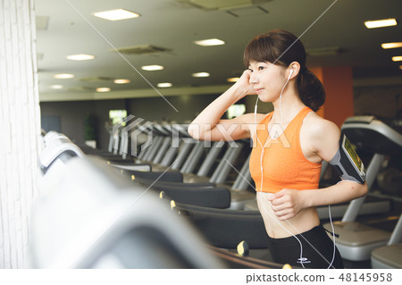 A young woman going to a sports club 48145958