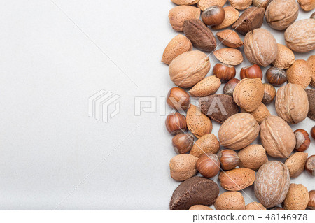 Different kinds of nuts in the shell 48146978