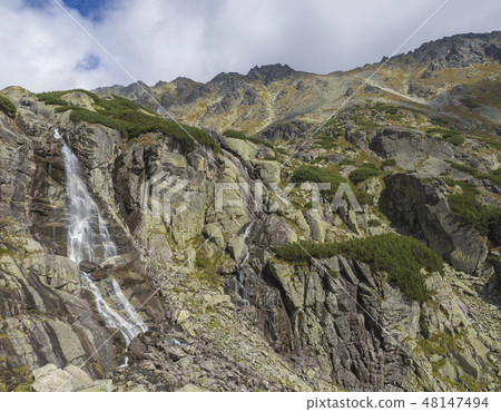 Skok waterfall High Tatras mountain, summer sunny day, Strbske Pleso, Slovakia 48147494