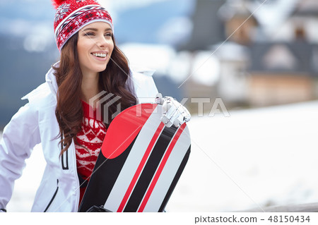 sexy woman with snowboard outdoors sexy woman with snowboard outdoors 48150434