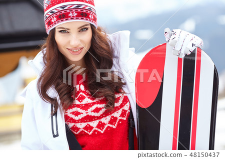 sexy woman with snowboard outdoors 48150437
