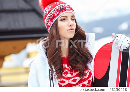 sexy woman with snowboard outdoors sexy woman with snowboard outdoors 48150438
