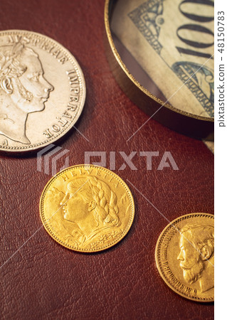 Antique coins closeup Antique coins closeup 48150783