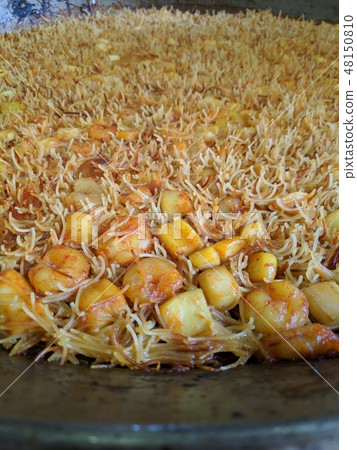 Thin noodle fideua, a typical Valencian plate 48150810