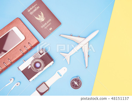 travel objects on blue yellow background with pa travel objects on blue yellow background with pa 48151137