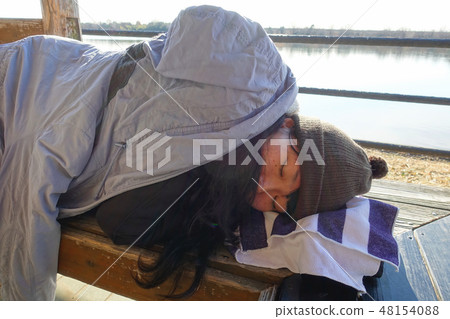 A woman living in the house A woman living in the house 48154088