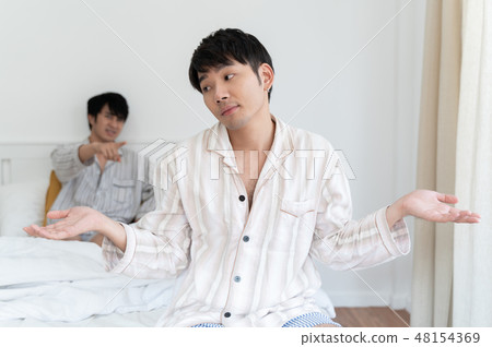 Gay couple having argument at home 48154369