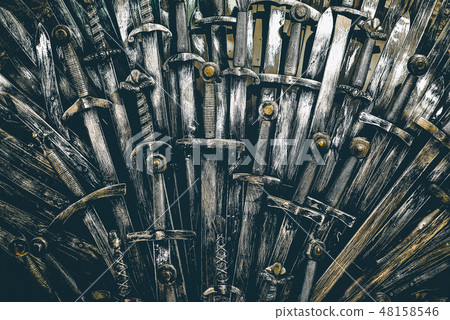 Metal knight swords background. Close up. The concept Knights. Metal knight swords background. Close up. The concept Knights. 48158546