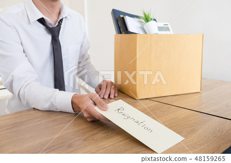 Businessmen are holding resignation document and packing persona 48159265