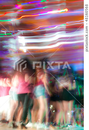 Unrecognizable crowd of ypung people Unrecognizable crowd of ypung people 48160568