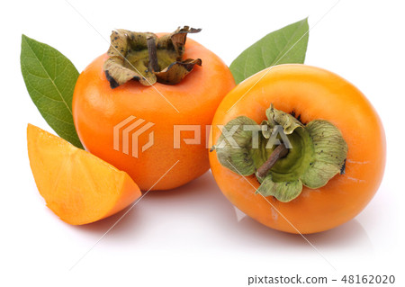 Persimmon fruit with slice and leaf isolated 48162020