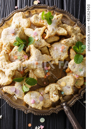 Christmas figure cookies with pecans, anise Christmas figure cookies with pecans, anise 48162408