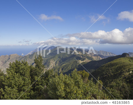 view point Amogoje, green hills with rock in the sea El Draguillo in anaga mountain, tenerife canary 48163865