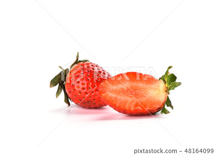 Half and whole strawberries isolated on white 48164099