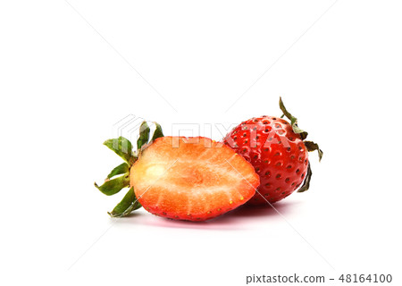 Half and whole strawberries isolated on white 48164100