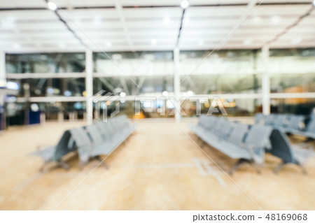 Abstract blur and defocused airport terminal interior Abstract blur and defocused airport terminal interior 48169068