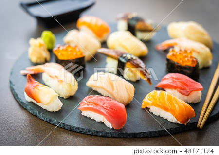 Nigiri sushi set with salmon tuna shrimp prawn eel shell and other sashimi Nigiri sushi set with salmon tuna shrimp prawn eel shell and other sashimi 48171124