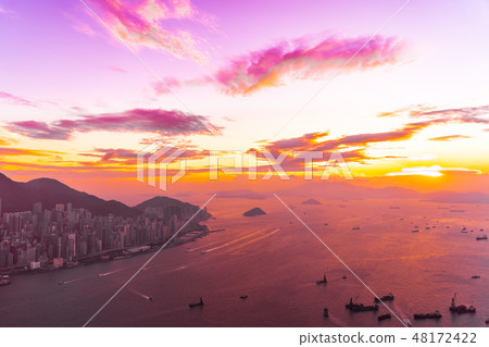 Beautiful colorful sunset in hong kong city skyline Beautiful colorful sunset in hong kong city skyline 48172422