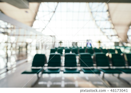 Abstract blur and defocused airport terminal interior Abstract blur and defocused airport terminal interior 48173041