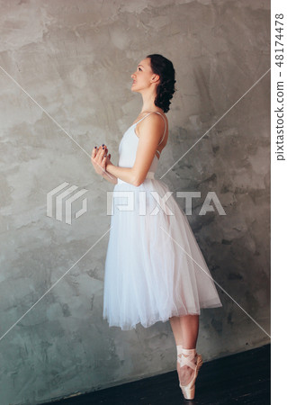 Ballet dancer ballerina in beautiful light dress 48174478