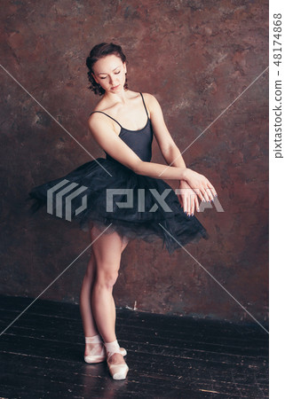 Ballet dancer ballerina in beautiful black dress  48174868