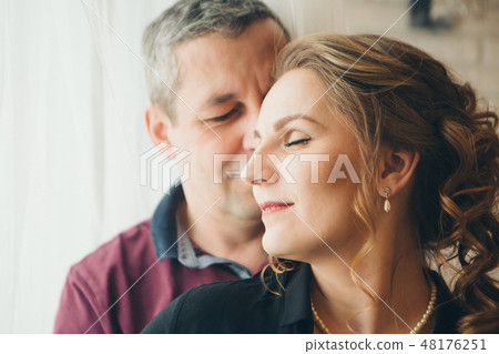 couple in love hugs on white background couple in love hugs on white background 48176251
