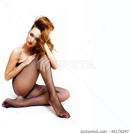 Sexy young woman in black pantyhose and lingerie, red lips, sexy look 48176847