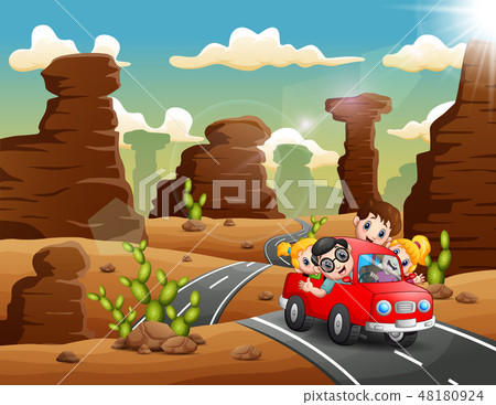 Happy children traveling by red car through Happy children traveling by red car through 48180924