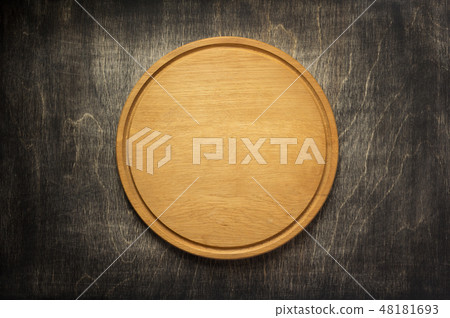 cutting board at old wooden table cutting board at old wooden table 48181693