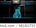 3d printer prints the model of female body, process of creating a bust of girl on 3d printer. 48181733