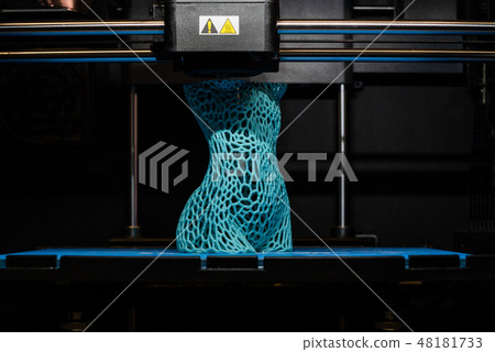 3d printer prints the model of female body, process of creating a bust of girl on 3d printer. 3d printer prints the model of female body, process of creating a bust of girl on 3d printer. 48181733