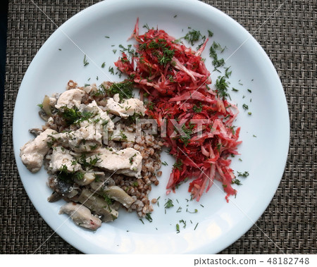 Cabbage and chicken. Dinner. Cabbage and chicken. Dinner. 48182748