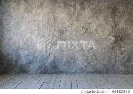 Gray textured wall of concrete and wood floor. Free space for text 48182830