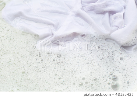 Soak cloth before washing, white shirt Soak cloth before washing, white shirt 48183425