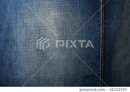 Denim chair. Modern armchair over rustic wall in Living room interior redecoration renovation Denim chair. Modern armchair over rustic wall in Living room interior redecoration renovation 48183597