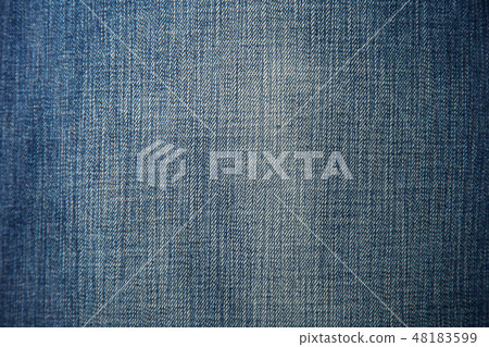 Denim chair. Modern armchair over rustic wall in Living room interior redecoration renovation Denim chair. Modern armchair over rustic wall in Living room interior redecoration renovation 48183599