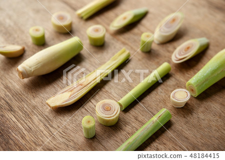 lemongrass slices on wood background. 48184415