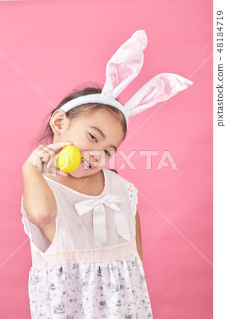 girl with rabbit ears Easter day 48184719