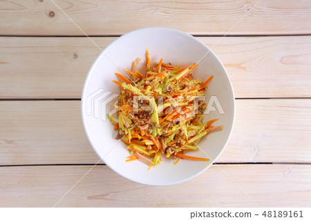 Salad with carrot, cabbage, paprika and walnut Salad with carrot, cabbage, paprika and walnut 48189161