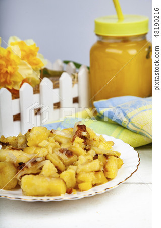 Fried potatoes on the dinner table. Fried potatoes on the dinner table. 48190216