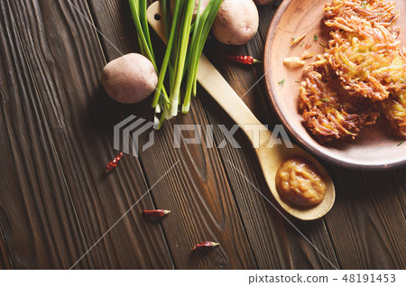 Top view at flat lay tasty potato pancakes Top view at flat lay tasty potato pancakes 48191453