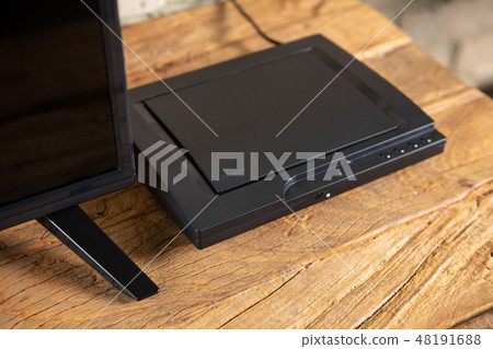 Compact DVD player in the interior on the TV Cabinet Compact DVD player in the interior on the TV Cabinet 48191688